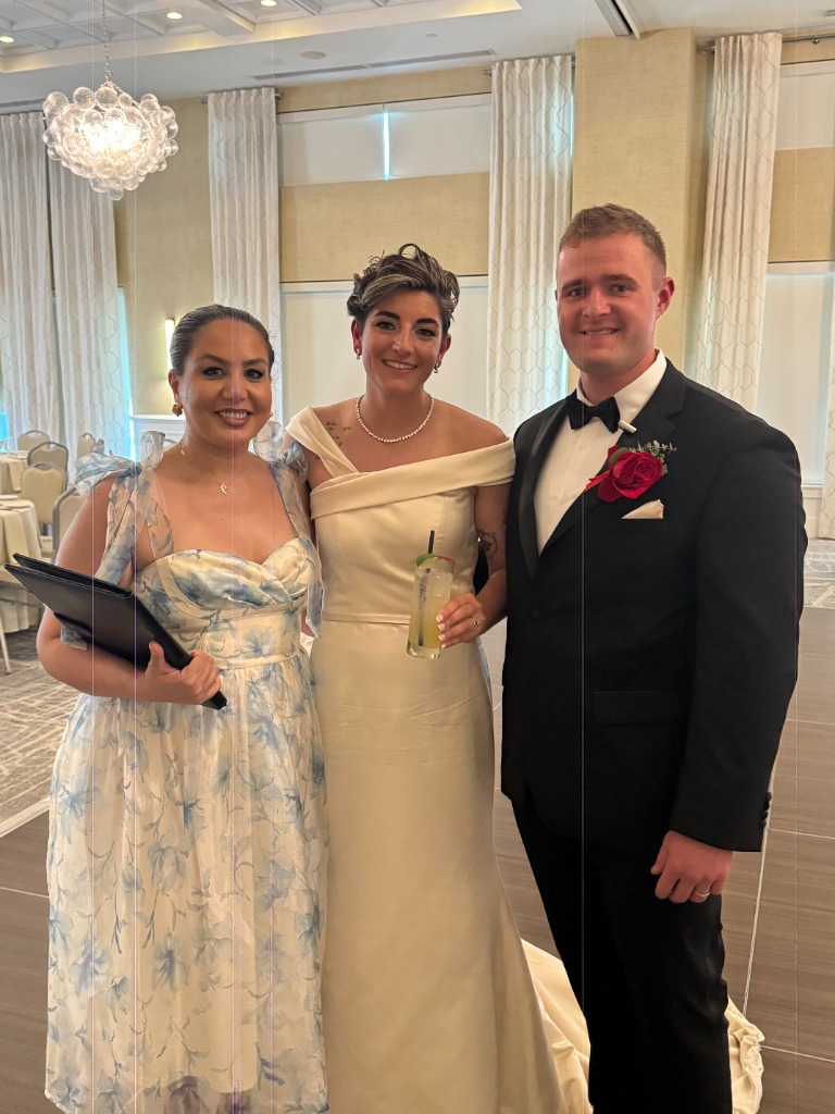 Elmira Jafari celebrating with newly wedded bride Nikki and groom Sam