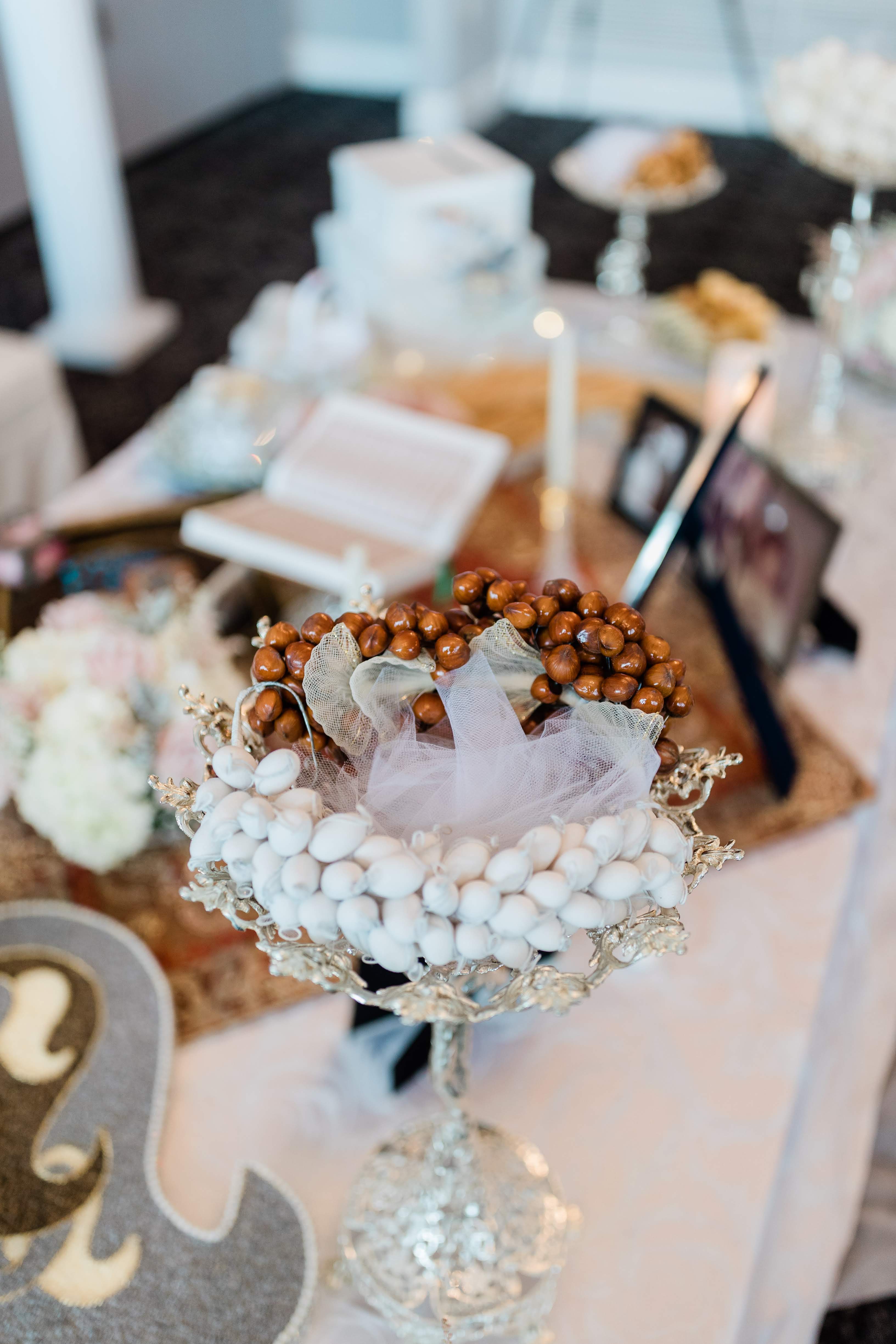 A Persian wedding ceremony featuring beautiful Sofreh Aghd setup