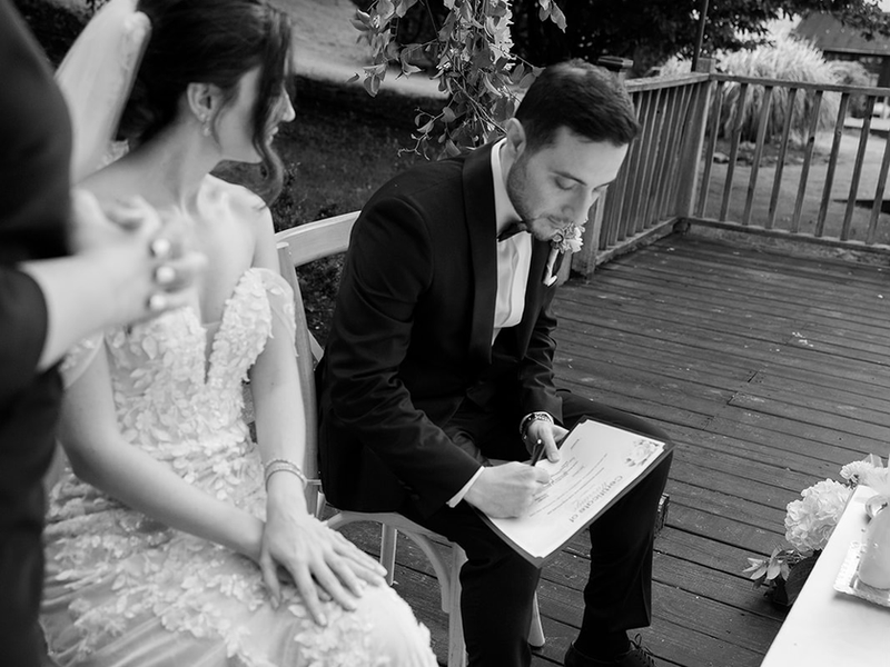 Couple exchanging vows with the officiant